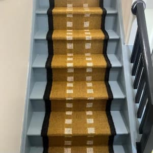 Rachel’s mustard stair runner, an original customer installation photo